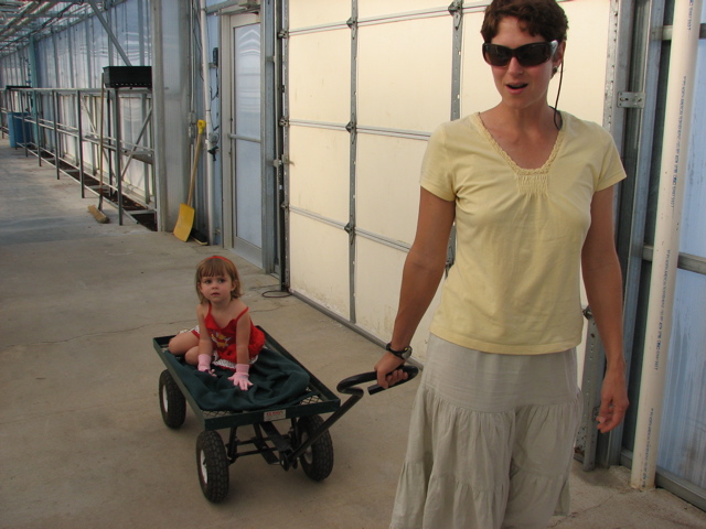 Bri checking out the greenhouse w/ Maeve