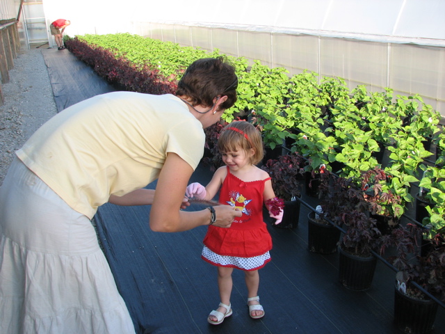 Bri & Maeve checking out flowers