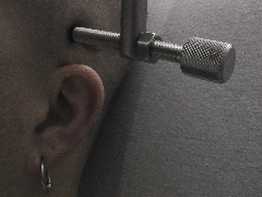 A close up of the screw into the side of my head